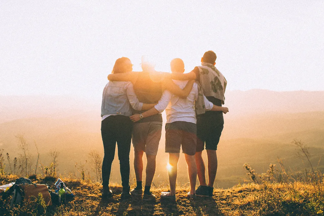 stock image of friends hugging