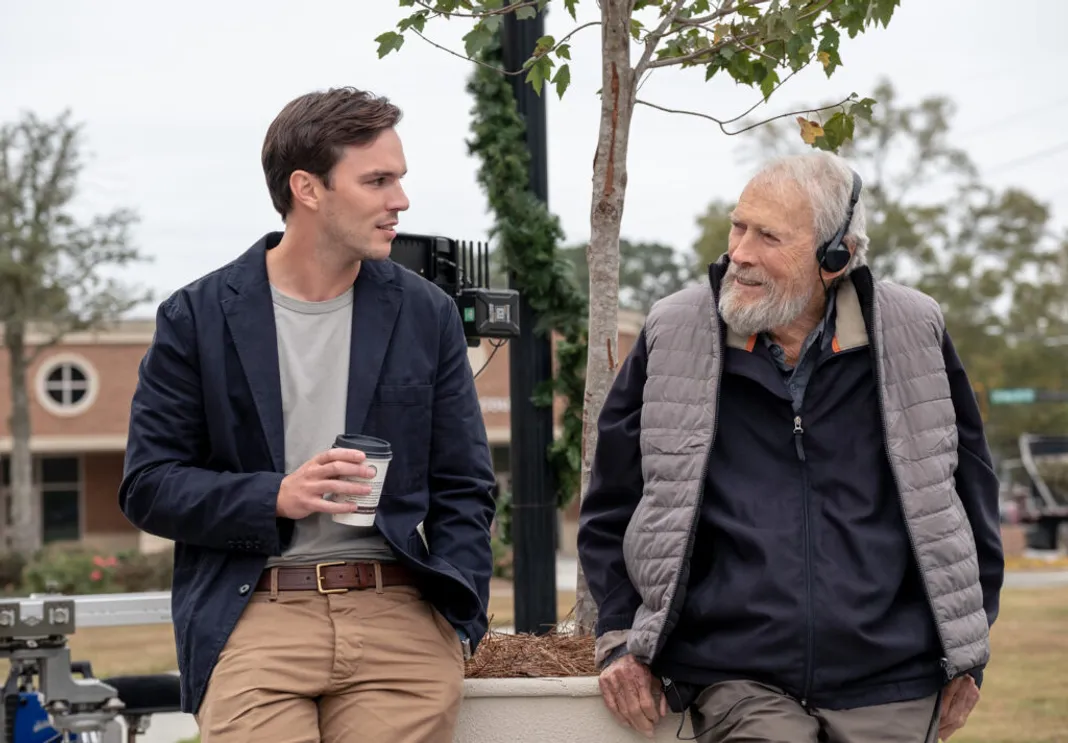 NICHOLAS HOULT and director CLINT EASTWOOD on the set of Warner Bros. Pictures - Credit: Warner Bros. Pictures
