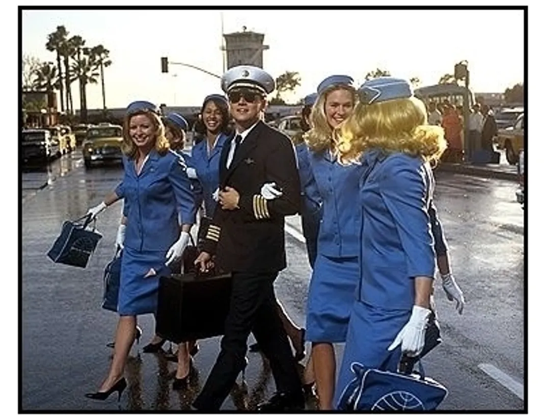 Catch Me if You Can movie still: Passing himself off as an airline pilot, Frank Abagnale (Leonardo Dicaprio) finds the perfect camouflage-surrounded by a bevy of beautiful stewardesses in Catch Me if 