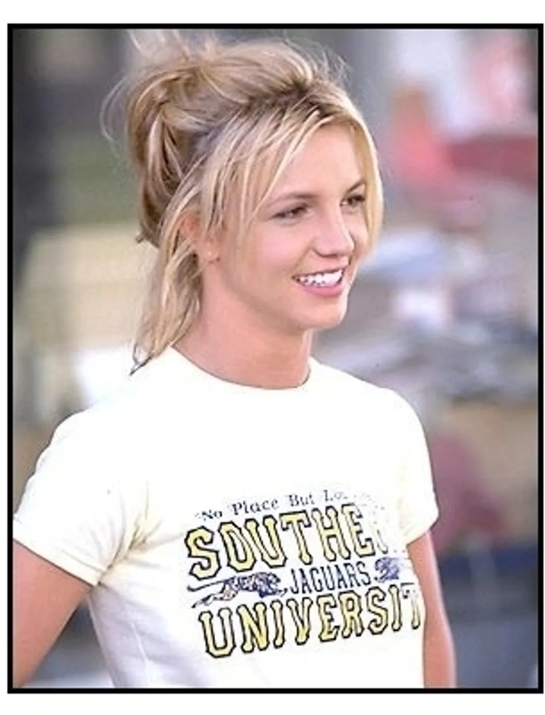 Crossroads movie still: Lucy (Britney Spears) in white T-shirt