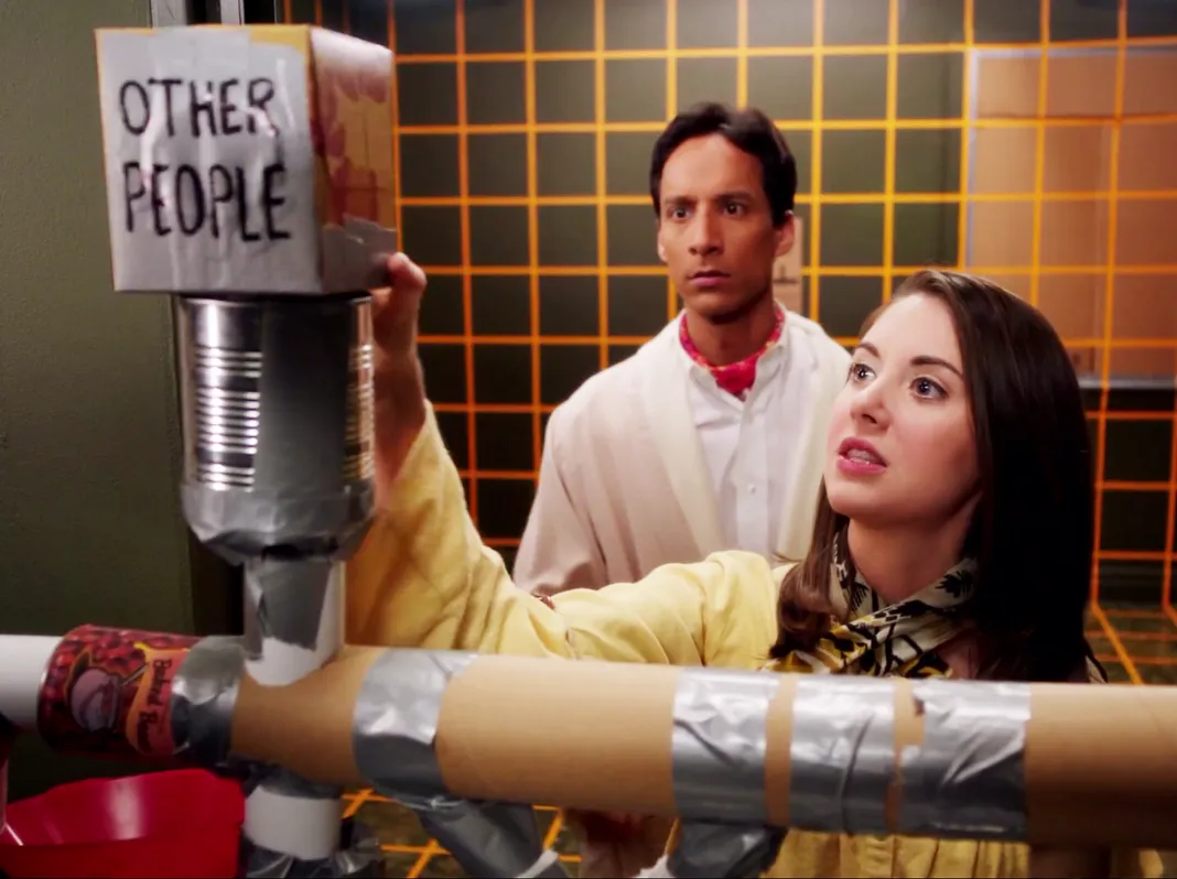 Danny Pudi and Alison Brie, Community