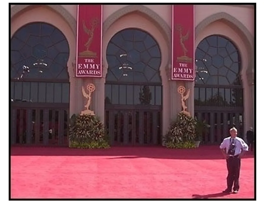 Emmy 2001 Cancellation: A man stands alone in front of the Shrine auditorium  after the Emmy Awards were cancelled 
