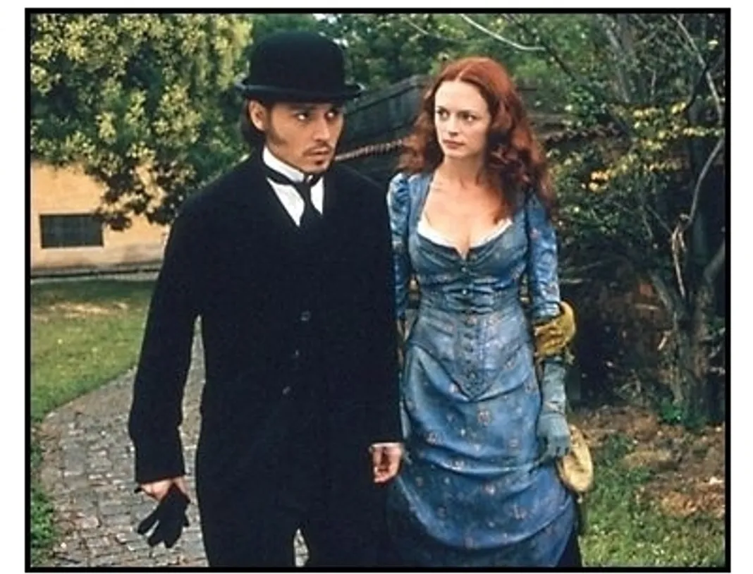 From Hell movie still: Johnny Depp and Heather Graham