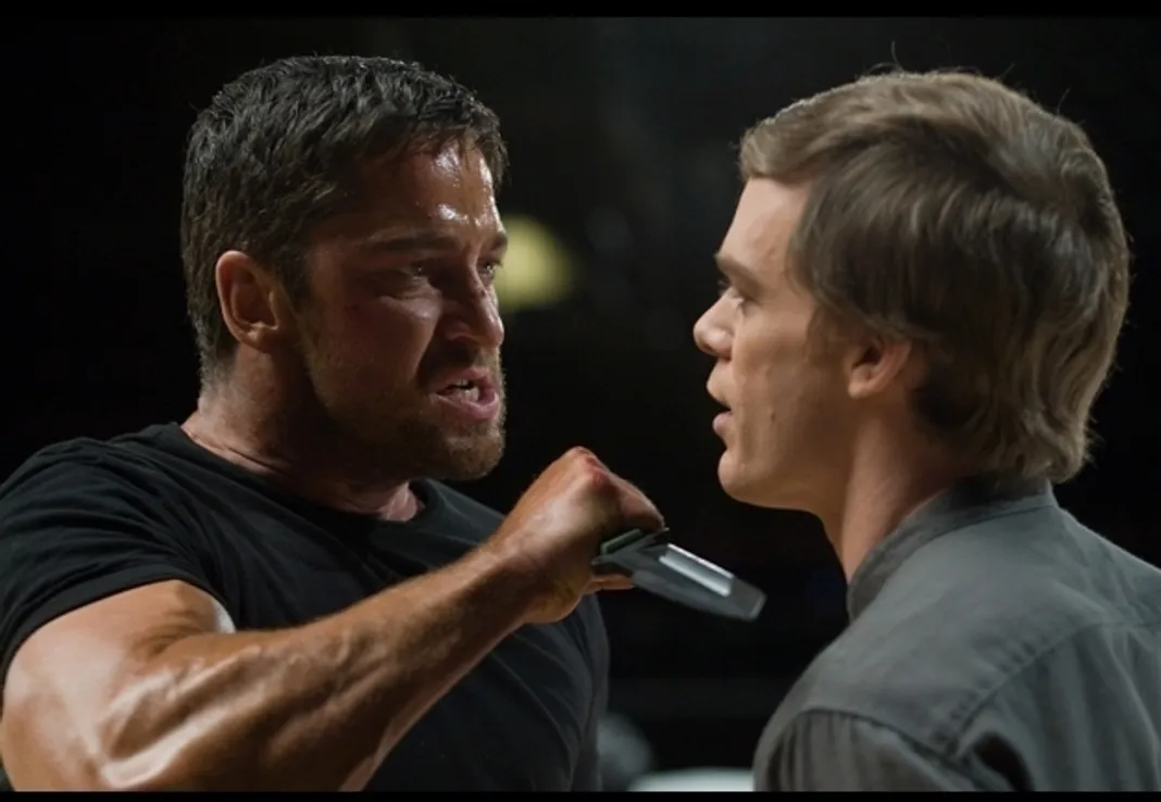 Gerard Butler (left, as Kable) and Michael C. Hall (right, as Ken Castle) star in Lionsgate's 'Gamer'