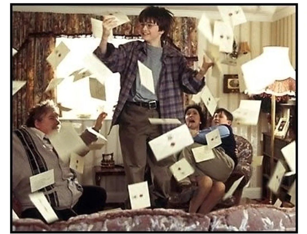 Harry Potter movie still: Daniel Radcliffe is showered by letters 