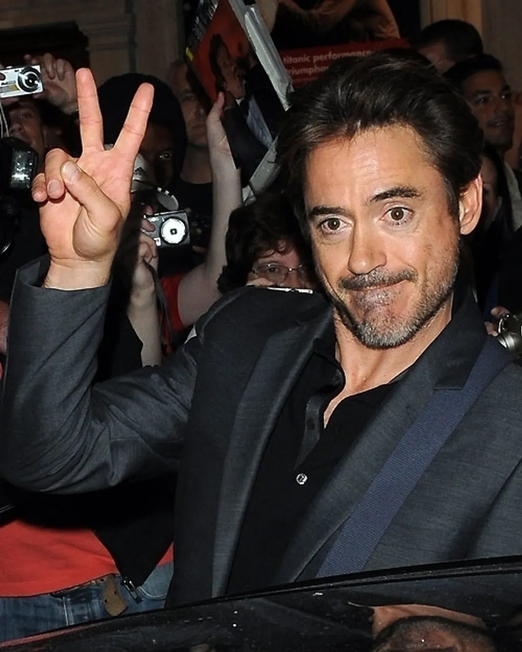 Robert Downey Jr. leaving the Wyndham's Theatre after watching Jude Law perform in 'Hamlet.' London, England, 8/23/09