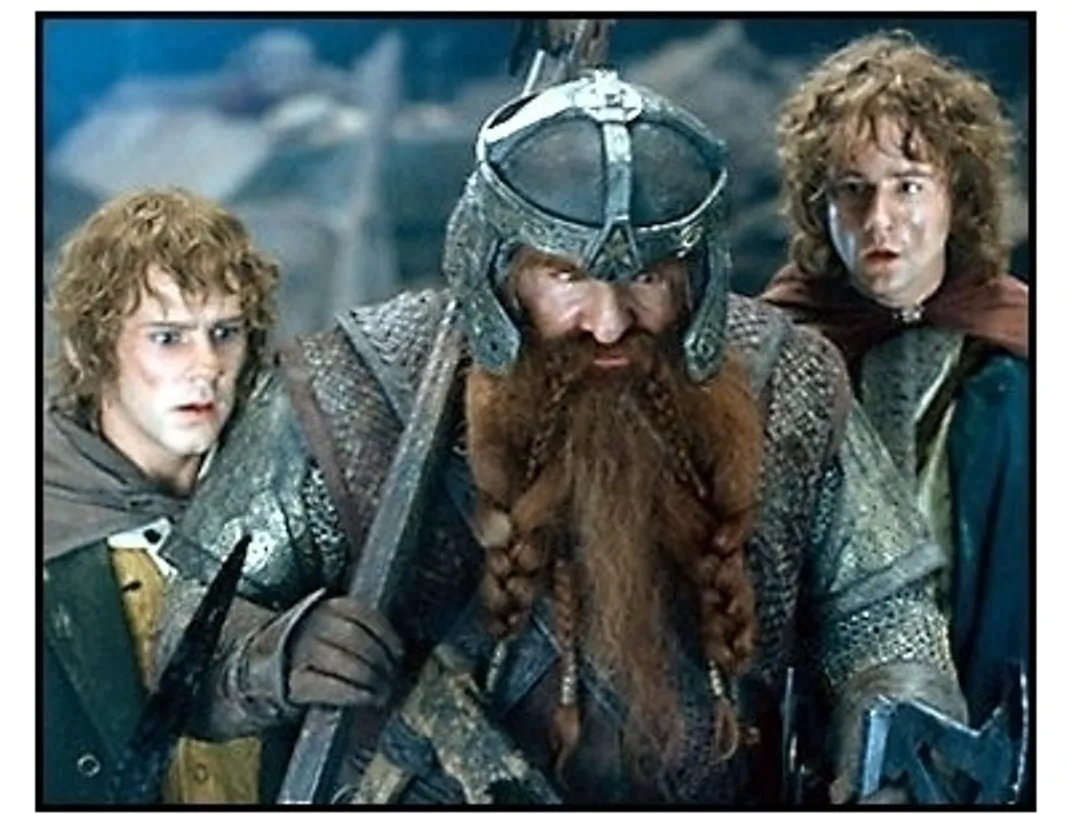 The Lord of the Rings:The Fellowship of the Ring movie still: Dwarf Gimli (John Rhys-Davies, Center) and Hobbits Merry (Dominic Monaghan) and Pippin (Billy Boyd)