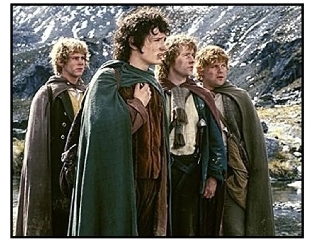 The Lord of the Rings: The Fellowship of the Ring movie still: Hobbits Merry (Dominic Monaghan), Frodo (Elijah Wood), Pippin (Billy Boyd), and Sam (Sean Astin)