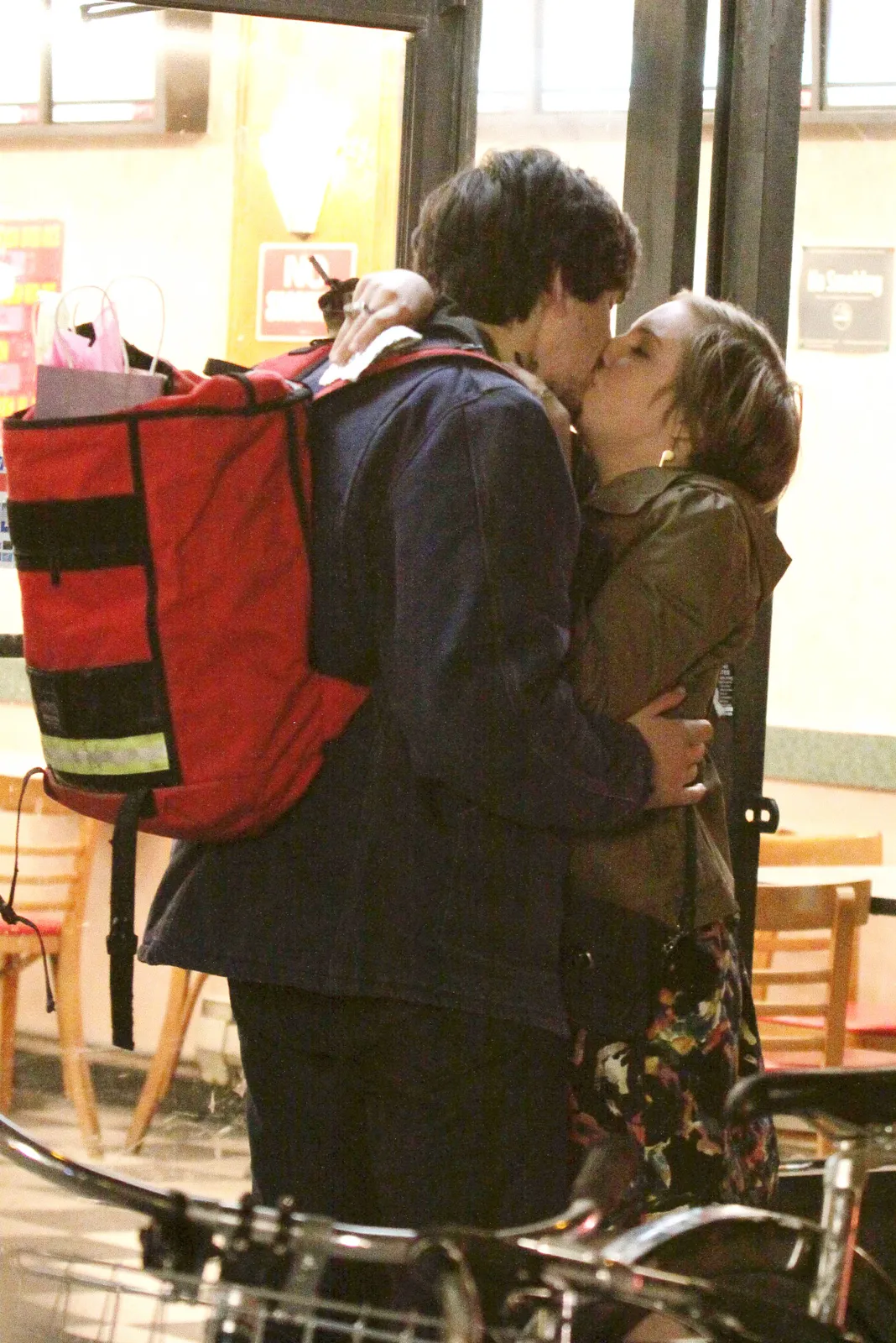 Lena Dunham and Adam Driver pictured filming a kissing scene